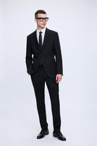 Slim fit notch lapel black smart casual suit with sleek modern cut and matching black dress shoes
