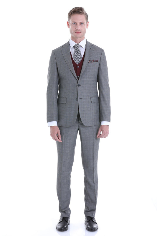Gray checkered men’s suit with a matching vest and patterned tie.