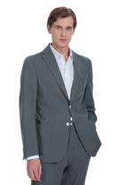 A sleek, charcoal-gray men’s suit jacket with a tailored fit and subtle texture.