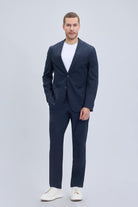 Navy blue slim fit notch lapel suit with lightweight fabric and subtle texture for casual modern wear