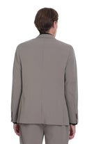 A tailored gray men’s suit jacket with black trim on the cuffs and collar.