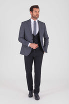 Men’s charcoal gray textured three-piece suit with matching vest and trousers.