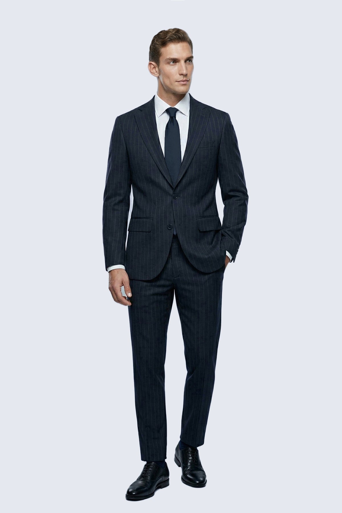 Slim fit notch lapel navy pinstripe suit with two-button jacket and matching trousers for smart casual wear