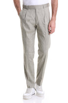 Light gray pleated chinos with a subtle textured weave and matching belt.