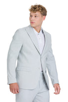 Slim fit light blue linen cotton suit jacket with peak lapel notched collar and two button closure