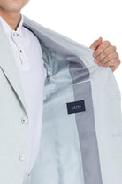 Light gray tailored blazer with subtle sheen in a slim fit peak lapel light blue linen-cotton suit