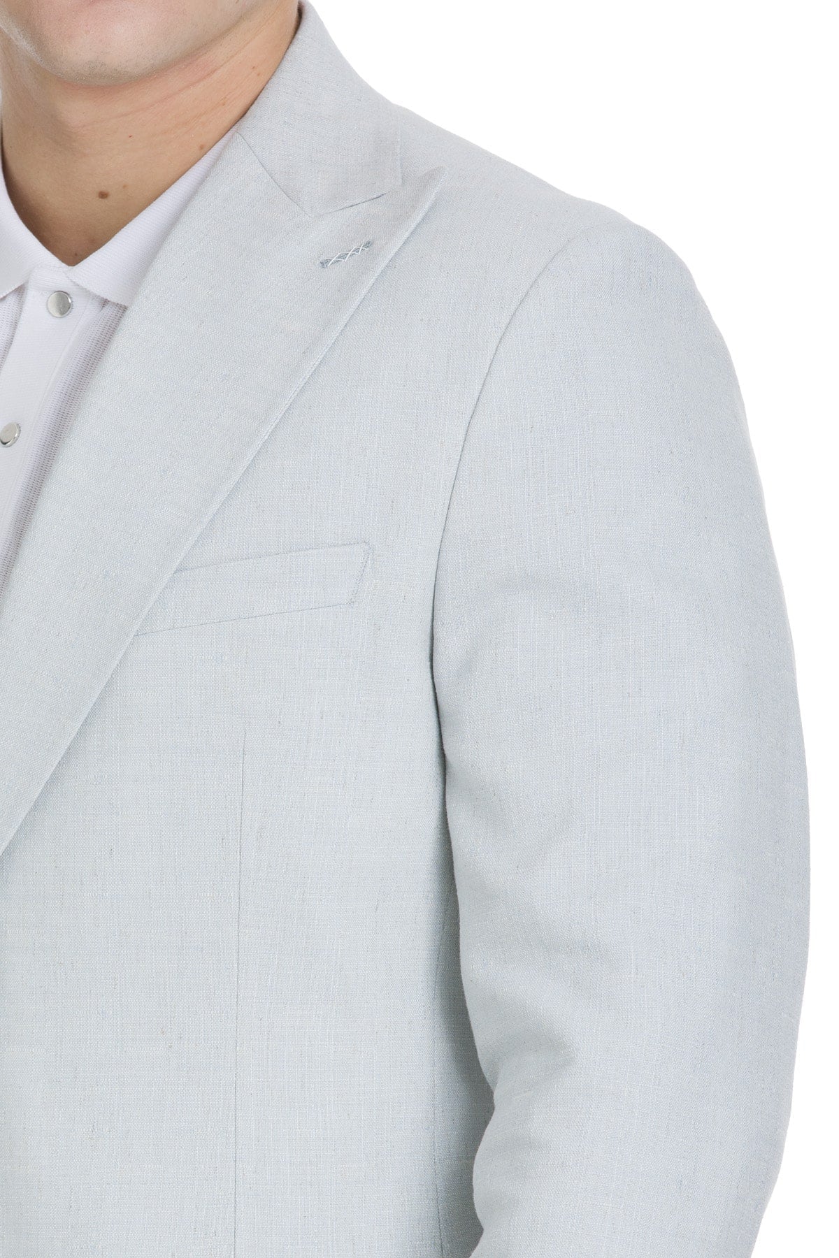 Light gray tailored blazer with subtle textured weave and structured peak lapel in slim fit light blue linen-cotton suit