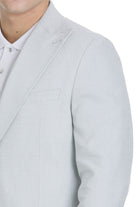Light gray tailored blazer with subtle textured weave and structured peak lapel in slim fit light blue linen-cotton suit