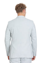 Slim fit light blue peak lapel suit jacket made of linen-cotton with a clean structured design and subtle texture