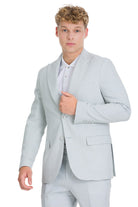 Slim fit light blue linen-cotton suit jacket with peak lapel notched collar and two front flap pockets