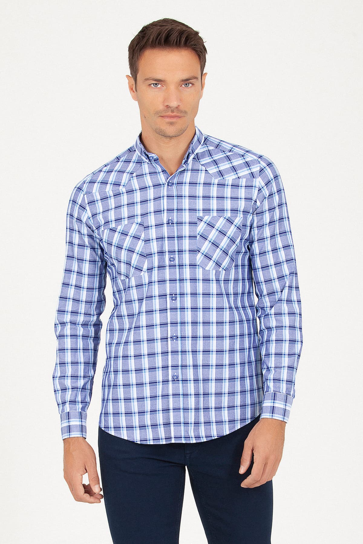 Blue and white plaid long-sleeved button-up shirt with chest pockets.