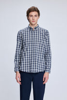 A navy and white plaid button-down shirt with a classic collar.