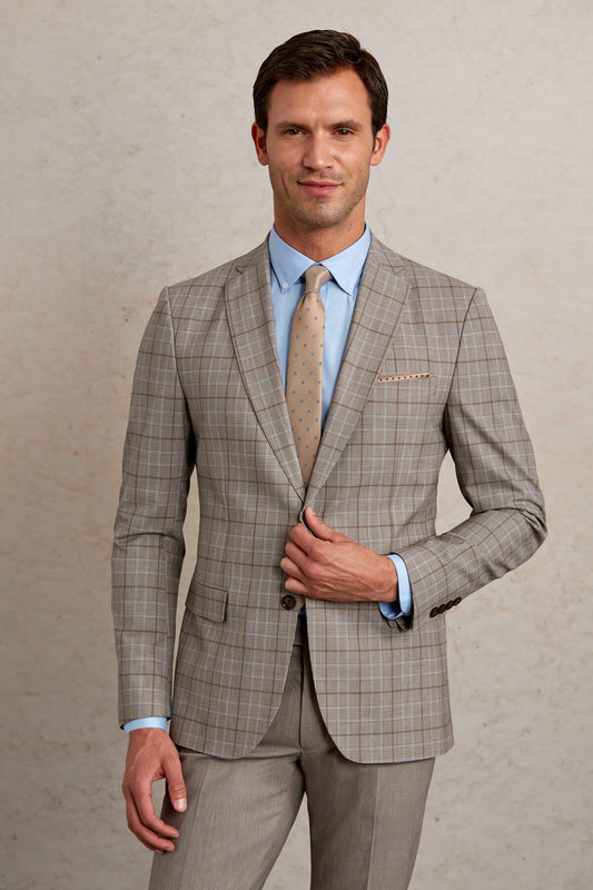 A tailored men’s blazer in a beige and gray plaid pattern, featuring notched lapels and matching pocket squares.