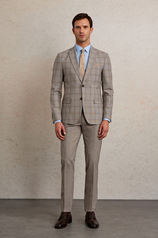 A tailored men’s suit in a light gray and beige plaid pattern, featuring a classic two-button jacket with matching trousers.