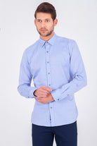 Light blue, long-sleeved men’s dress shirt with a classic collar and buttoned cuffs.