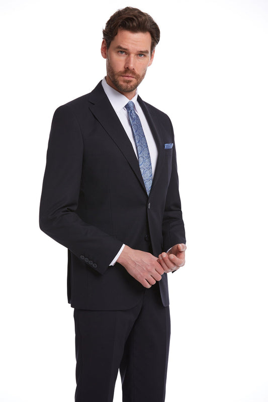 A sharply tailored navy blue wool suit with a subtle sheen, featuring classic notched lapels and matching trousers.