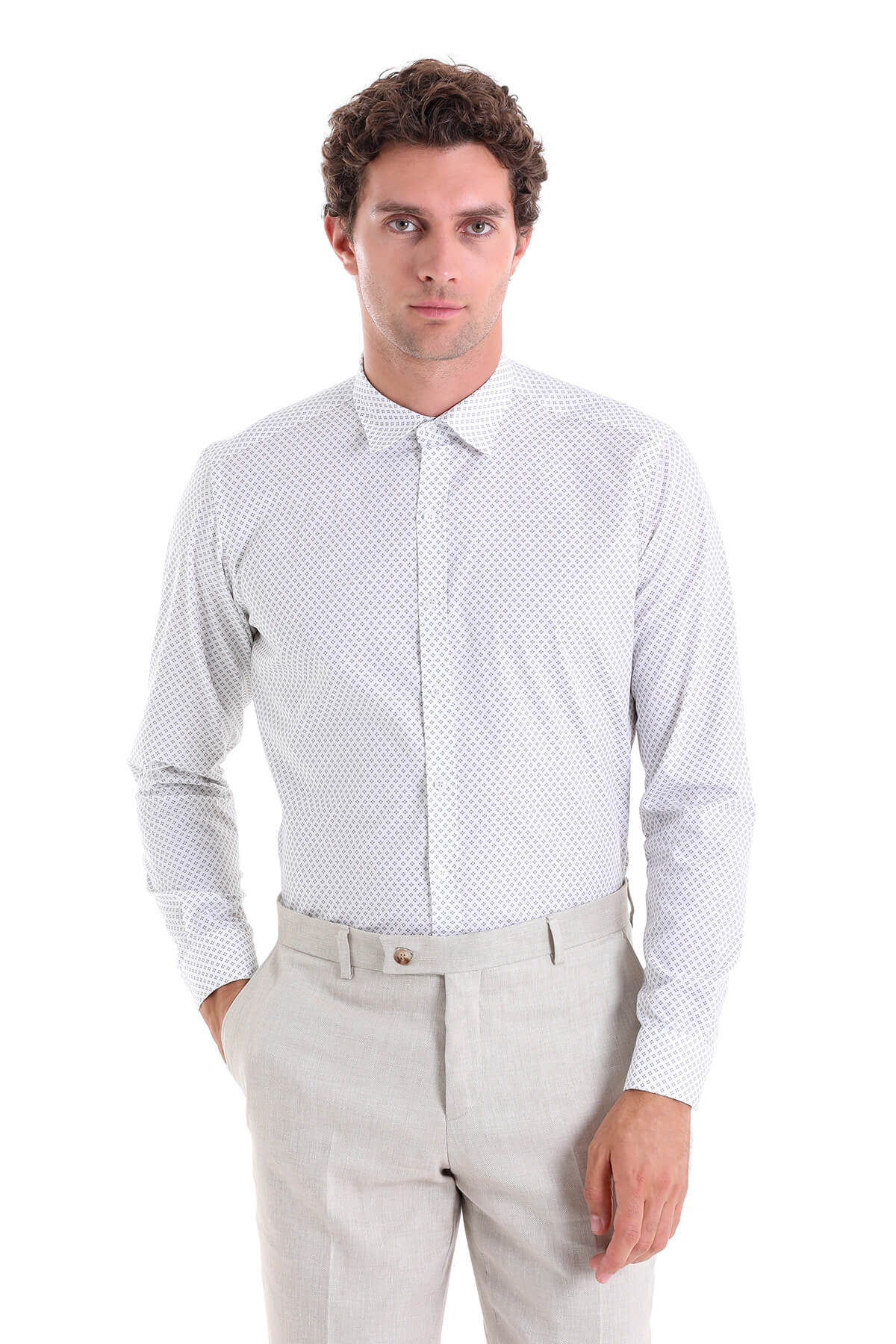 A crisp white long-sleeved dress shirt with a subtle geometric dot pattern.