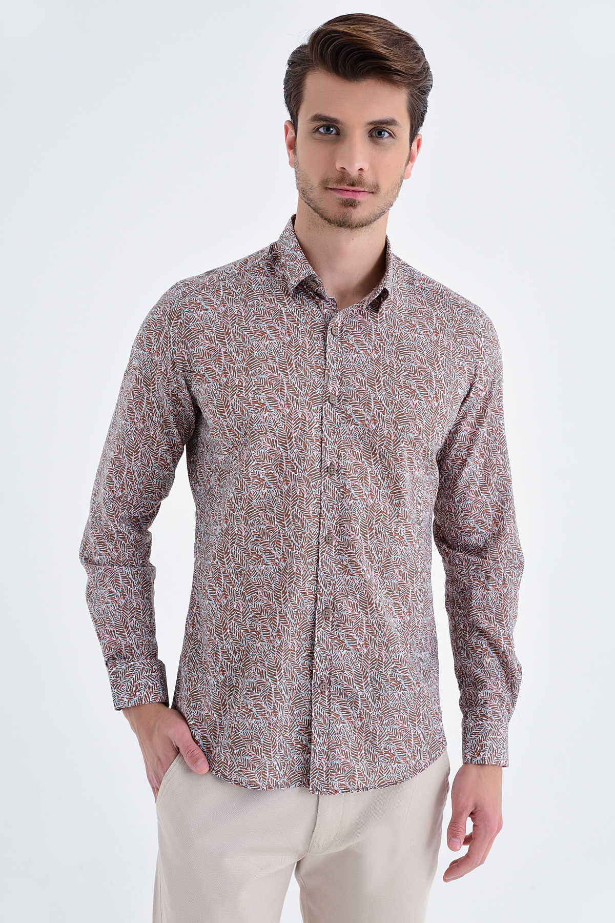 A men’s long-sleeved button-up shirt in a muted brown and beige abstract pattern, crafted from a lightweight fabric with neatly finished cuffs.