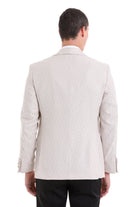 Slim fit beige textured blazer with floral jacquard pattern and tailored fit for elegant evening events