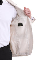 Slim fit shawl lapel beige floral jacquard wool blazer with black brand label on inner lining for classic tuxedo look