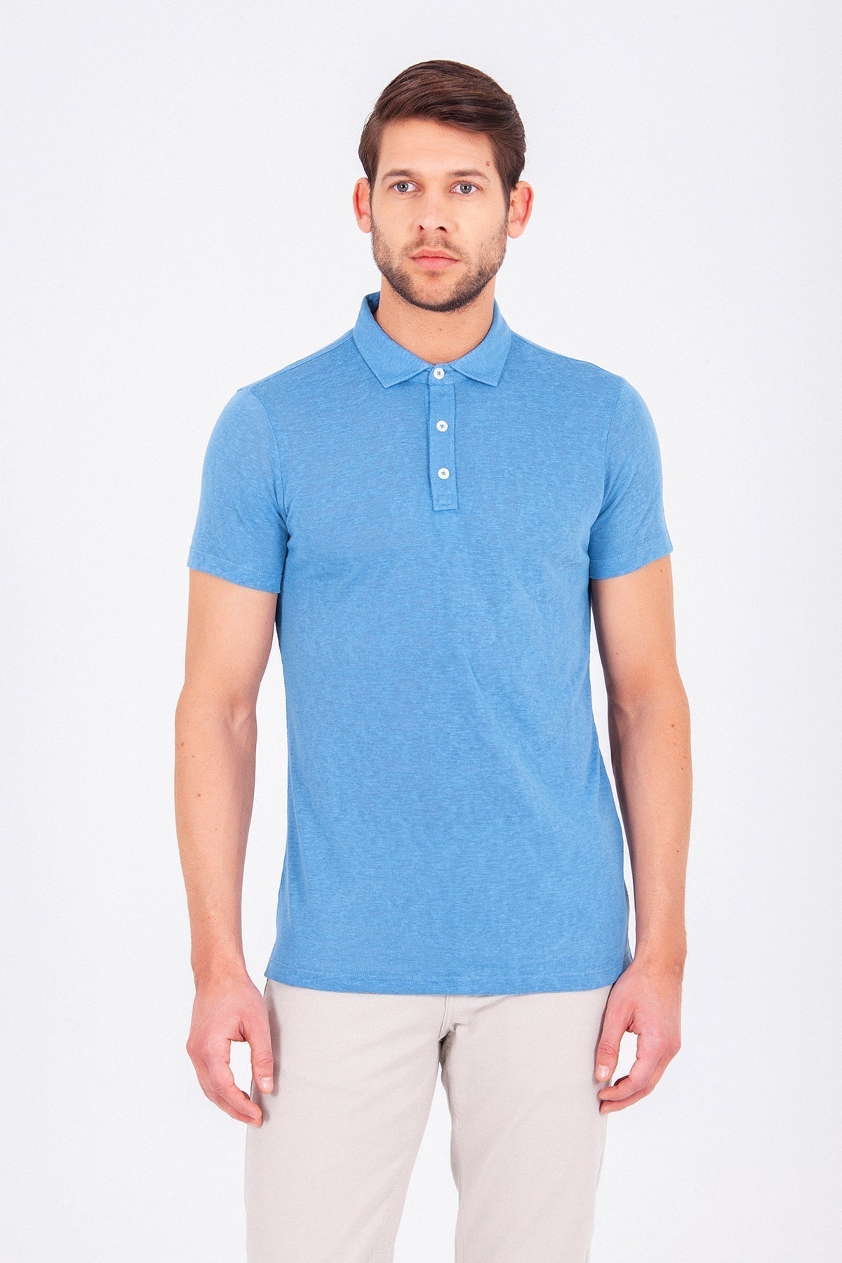 A light blue short-sleeved polo shirt with a classic collar and buttoned placket.