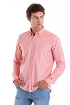 A pink button-down shirt with thin white vertical stripes.