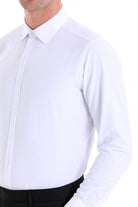 Slim fit white cotton blend dress shirt with classic collar and button-down front for a polished look
