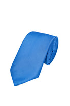 A vibrant royal blue silk tie, neatly rolled and displayed against a clean white background.