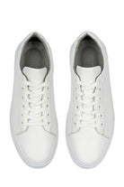 White leather low-top sneakers with matching laces and a clean, minimalist design.
